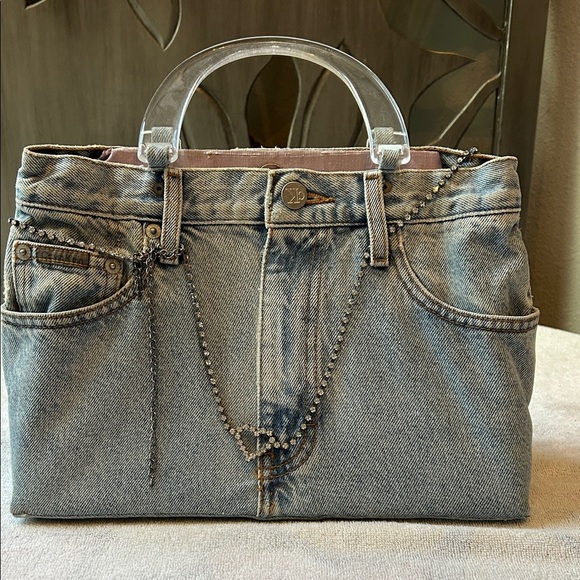Calvin Klein Jeans Handbags - Calvin Klein Jeans Light Blue Denim with Chain Accent hand bag.